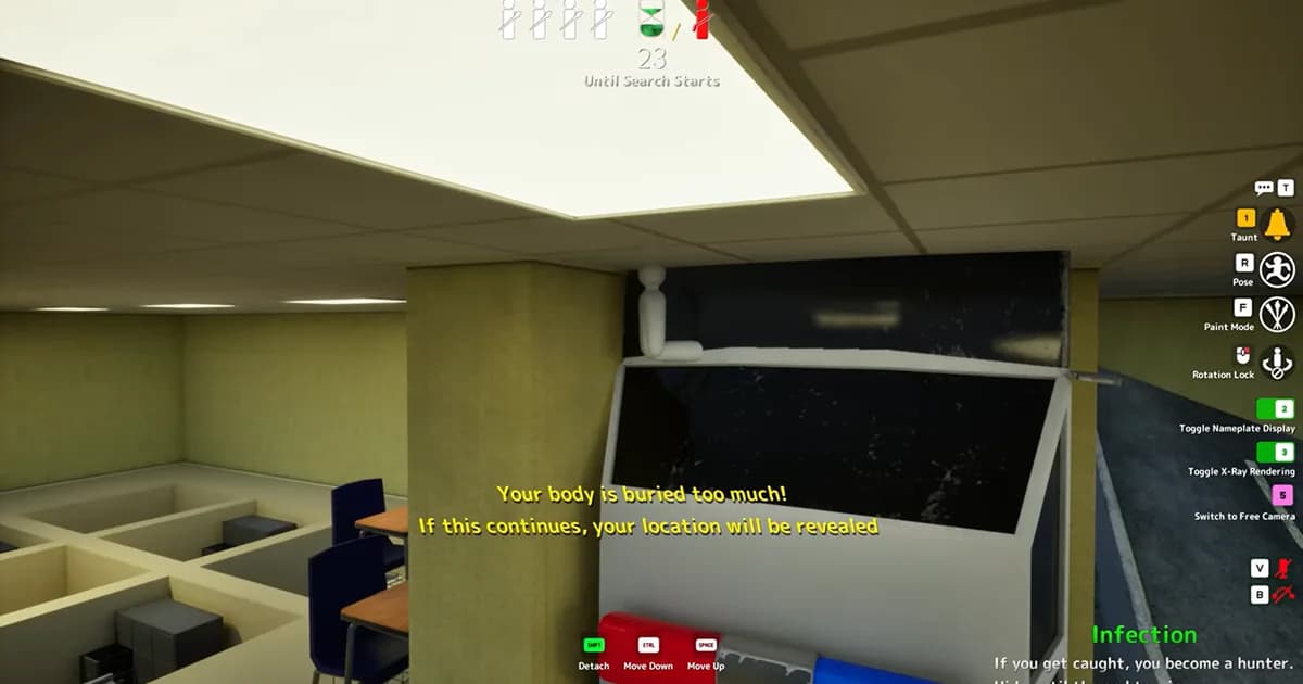 A hidden player is revealed on top of an office machine after surviving the entire round without being found.